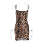 Leopard sequin mini sheath dress on mannequin with spaghetti straps and lace hem