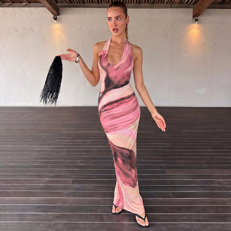 Women’s halter maxi dress in pink, rose, and cream abstract wave print