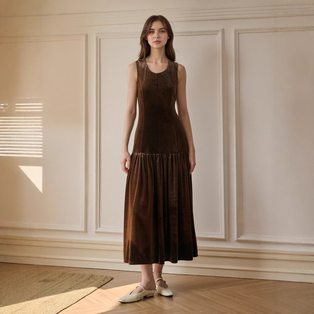 Brown velvet sleeveless dress with pleated hem and round neckline