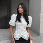 Women’s white fitted top with puff sleeves and scalloped lace irregular hem