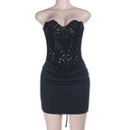 Black strapless lace mini dress with corset bodice and ruched skirt on mannequin
