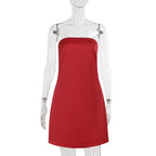 Red satin slip dress with thin straps and straight, fitted silhouette