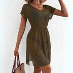 Olive green V-neck short-sleeve dress with gathered waist and flowing skirt