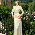 Women's pleated spring dress in light apricot, draped off-shoulder bodice, long sleeves