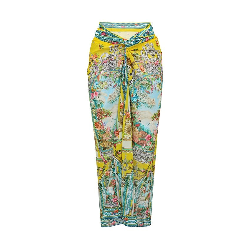 Long swim skirt in bright yellow, teal, and multicolor ornate print