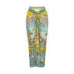 Long swim skirt in bright yellow, teal, and multicolor ornate print