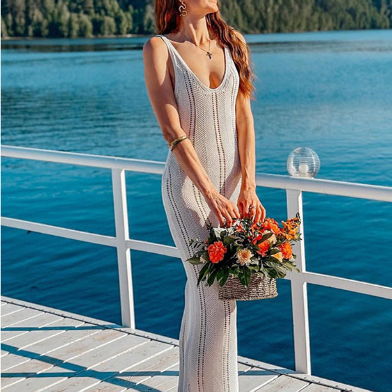 White sleeveless knit maxi dress with V-neck and open back