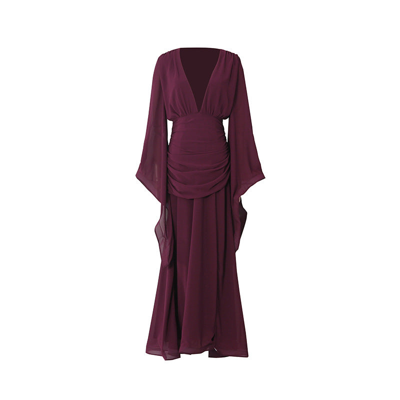 Women's autumn design dress front view, V-neck ruched waist and flowing layered skirt, dark purple