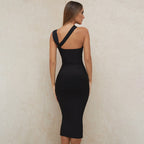 Black fitted midi dress with open back and halter strap at the shoulders