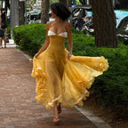 Yellow cami dress with white lace underbust and layered chiffon ruffle hem, flowing silhouette