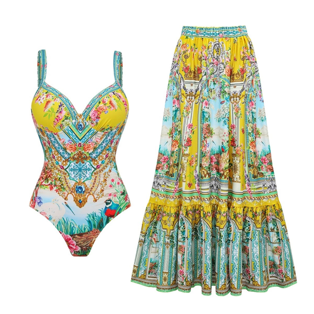 One-piece swimsuit and long swim skirt in bright yellow and teal with multicolor ornate floral print