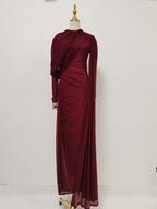 Burgundy pleated formal dress with long sleeves and diagonal drape wrap bodice, floor length