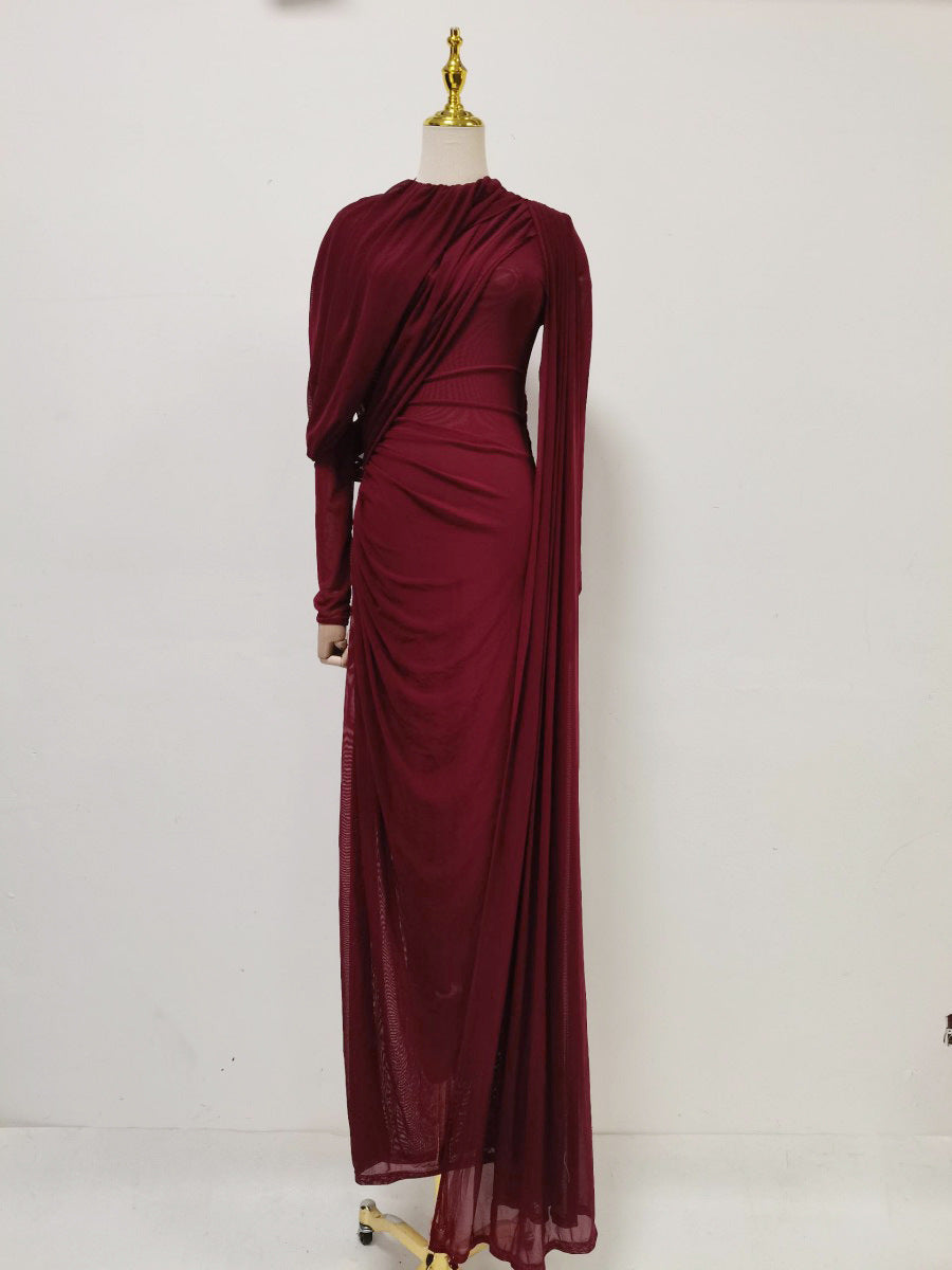 Burgundy pleated formal dress with long sleeves and diagonal drape wrap bodice, floor length