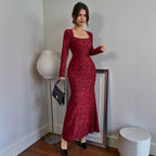 Red lace long-sleeve fitted midi dress with subtle textured pattern and flare hem