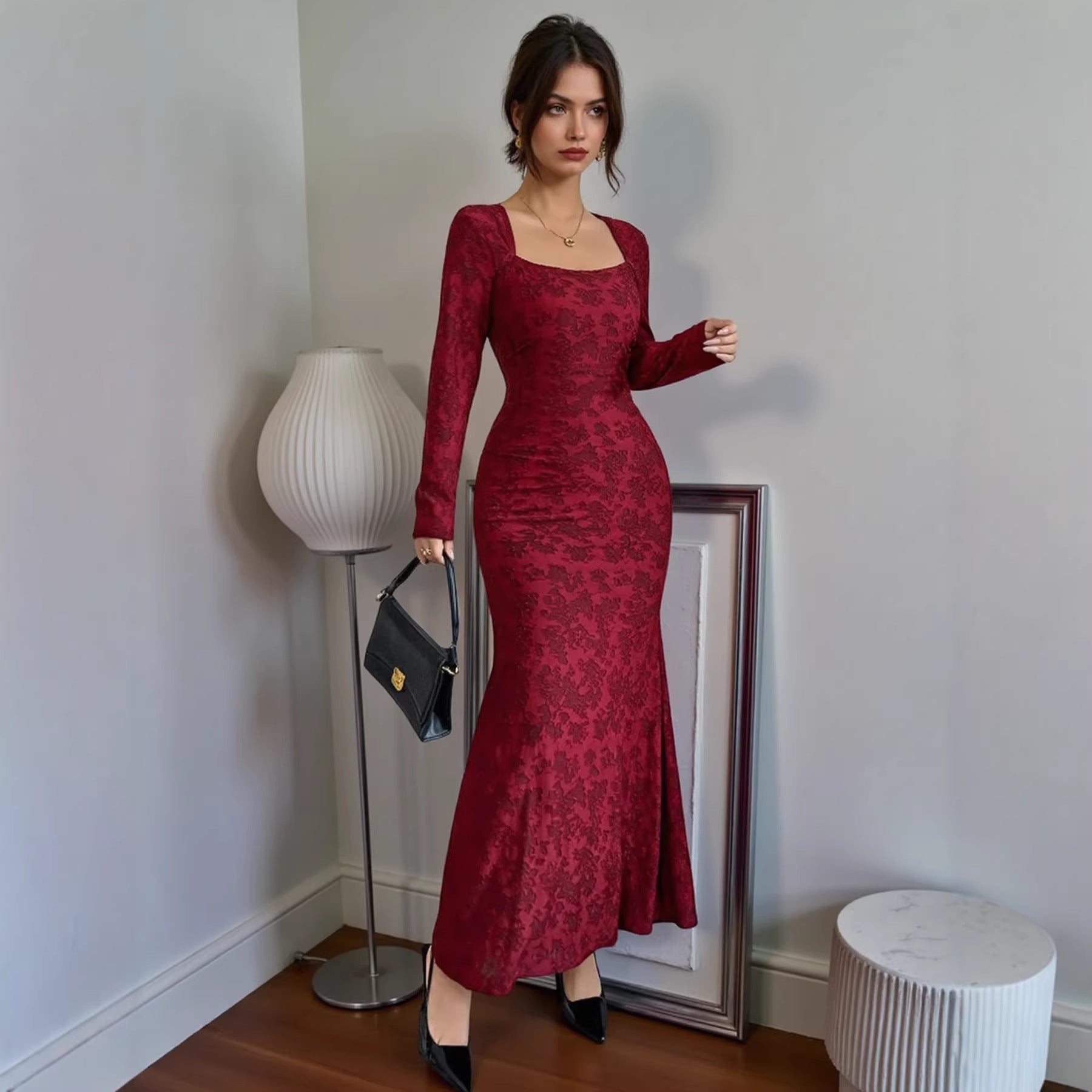 Red lace long-sleeve fitted midi dress with subtle textured pattern and flare hem