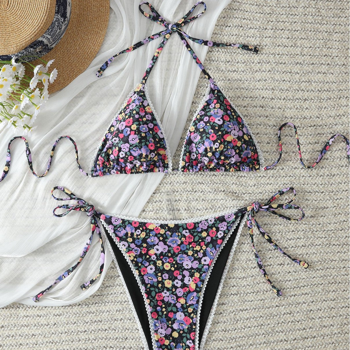 Floral halter one-piece swimsuit with triangle top and tied side strings