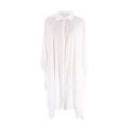 White bamboo cotton cover-up shirt with collar, button placket, and flowing loose silhouette.