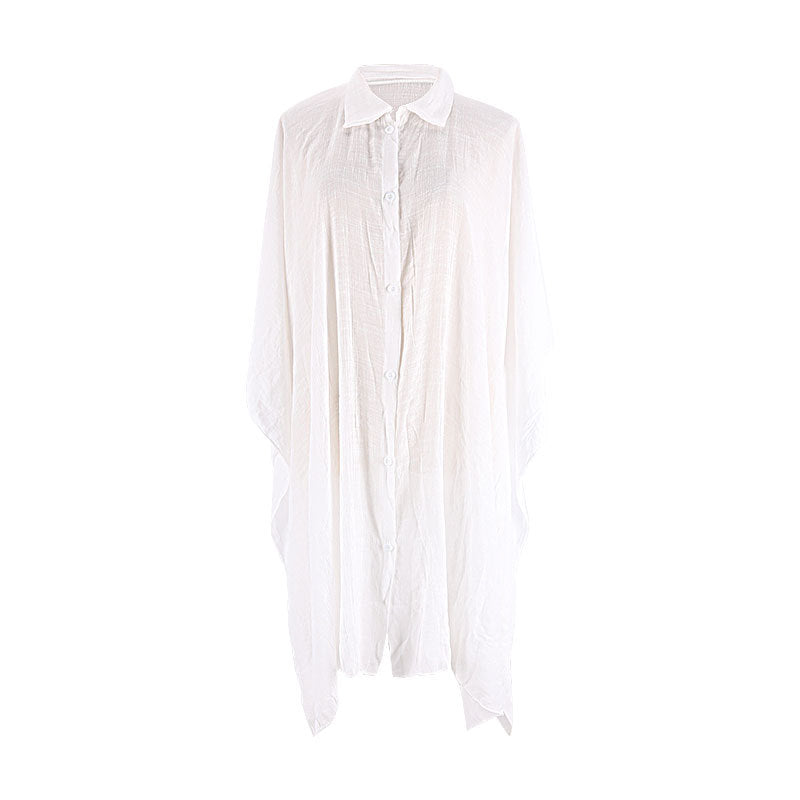 White bamboo cotton cover-up shirt with collar, button placket, and flowing loose silhouette.