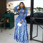 Blue floral long-sleeve maxi dress with high neckline and tiered gathered skirt