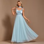 Turquoise halter floral dress with ruffled floral straps and gathered tulle skirt