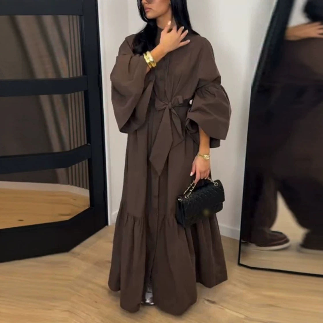 Dark brown lace long-sleeve dress with puff sleeves, bow waist and flowing tiered hem