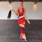 Women’s halter maxi dress in pink and rose abstract wave print