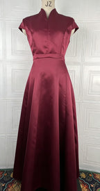Burgundy short-sleeve fit-and-flare dress with V-neck and pleated full skirt
