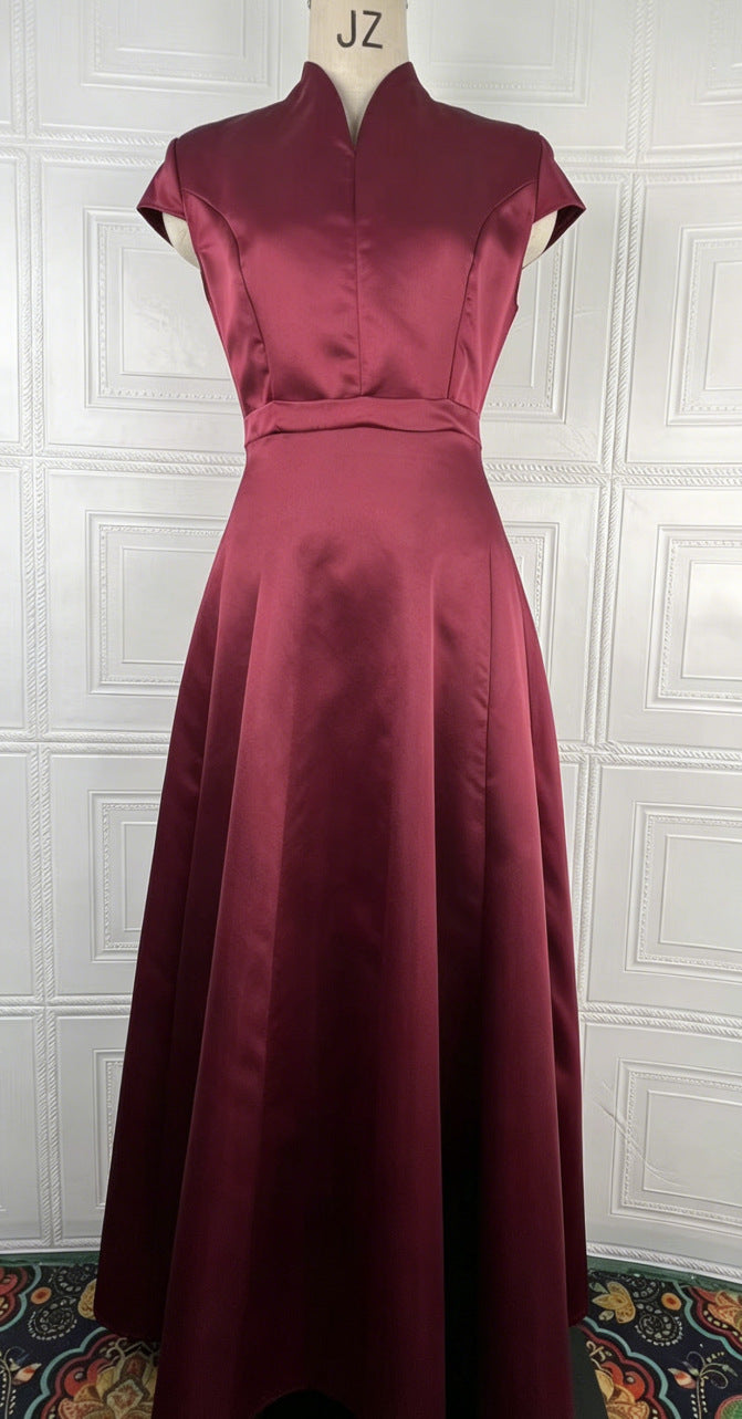 Burgundy short-sleeve fit-and-flare dress with V-neck and pleated full skirt