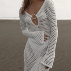 White hollow-out knit maxi dress with ring buckle V-neck and long sleeves, front