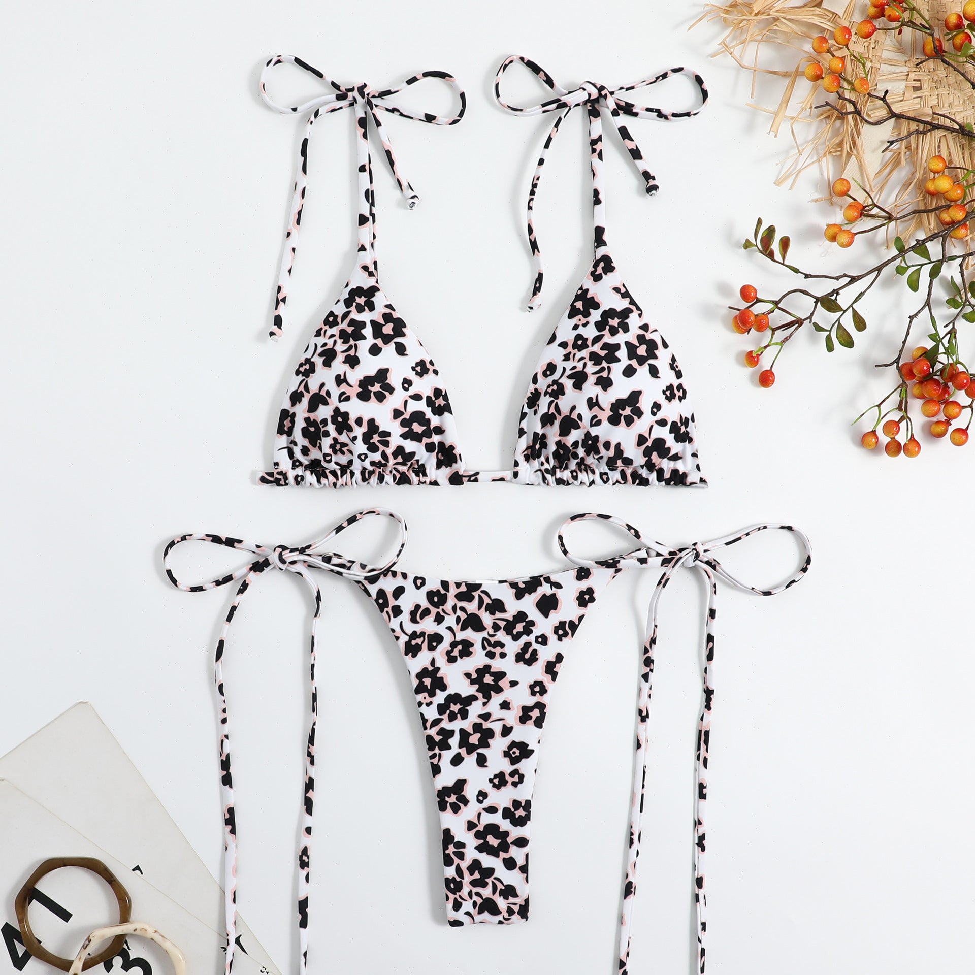 Black leopard print triangle bikini with tie straps and high-cut matching bottom