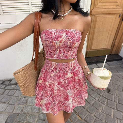 Coral red paisley two-piece set with strapless crop top and tiered mini skirt