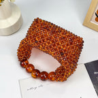 Women's Amber Beaded Dumpling Handbag