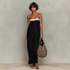 Black lace-trim maxi sling dress with spaghetti straps and white lace yoke
