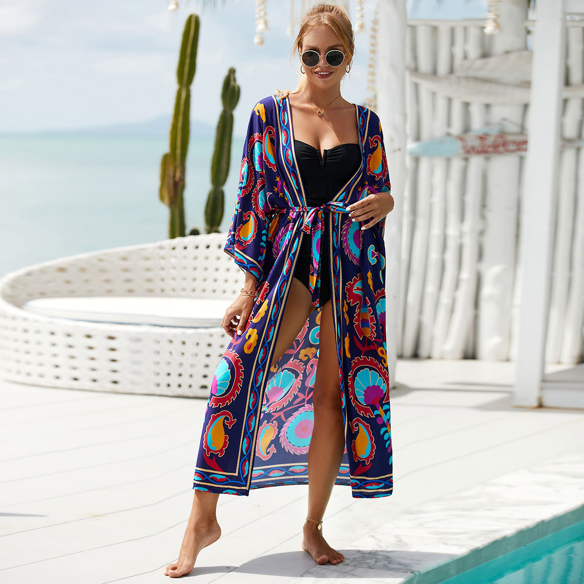 Printed beach jacket cardigan with colorful blue and pink patterns, tied waist kimono style