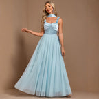 Turquoise halter floral maxi dress with ruched bodice and flowing tulle skirt
