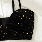 Black bikini bra with gold star pattern and thin adjustable straps