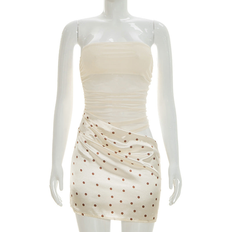 Apricot strapless mini dress with brown polka dots, ruched bodice and fitted skirt