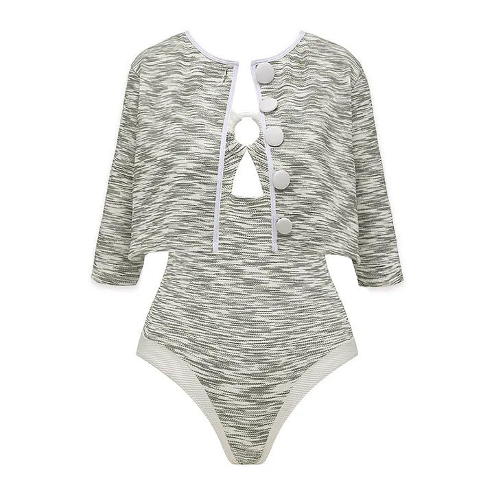 Gray cardigan with pom-pom buttons paired with matching high-cut one-piece swimsuit
