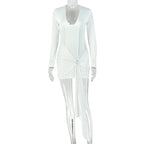 White long-sleeve dress with deep V-neck and ruched drape waist