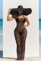 Black halter mesh maxi dress with cutout lattice pattern and supportive chest straps