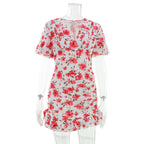 Floral summer dress on mannequin, red flower print, scoop neckline, short flutter sleeves