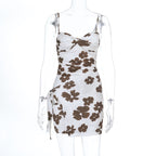 Slip summer dress on mannequin, ivory with brown floral print, ruched straps