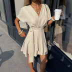 Light beige belted V-neck mini dress with short sleeves and flared hem