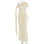 Light yellow maxi dress on hanger, draped back and ruched center knot detail