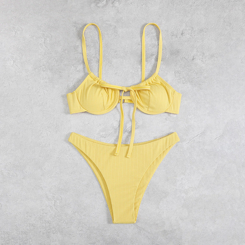 Lemon yellow one-piece swimsuit with underwire cups and tie-front detail