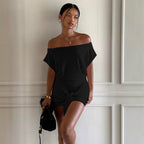 Black off-shoulder sheath short-sleeve dress with ruched waist tie and draped front