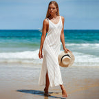 Cream sleeveless knit maxi dress with chevron stripe pattern and side slit
