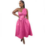 Pink sleeveless midi dress with front draped knot bodice and full skirt