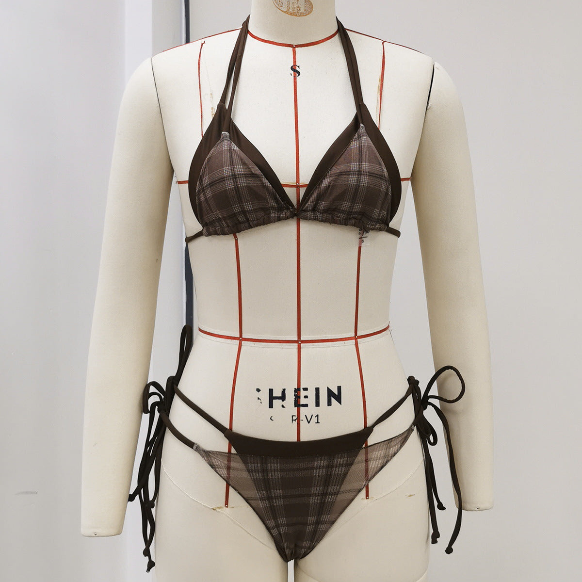 Brown plaid triangle bra and high-waist thong-style swim bottoms with tie sides