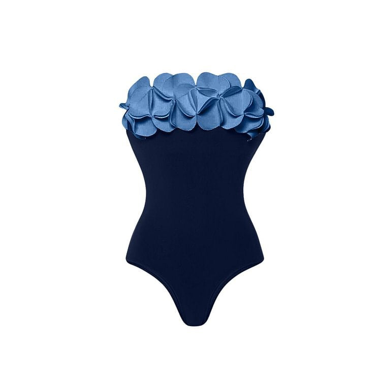 One-piece swimsuit with strapless light-blue ruffle flower bodice, dark navy